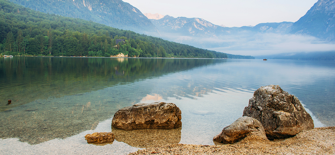 water surrounded by mountains